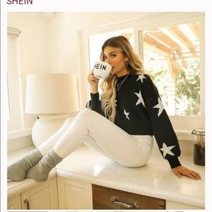 Super cute womens cropped stars sweater. Great condition, never worn.